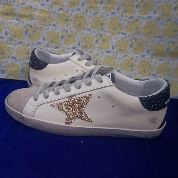 sophistication with these Golden Goose designer editions. YY